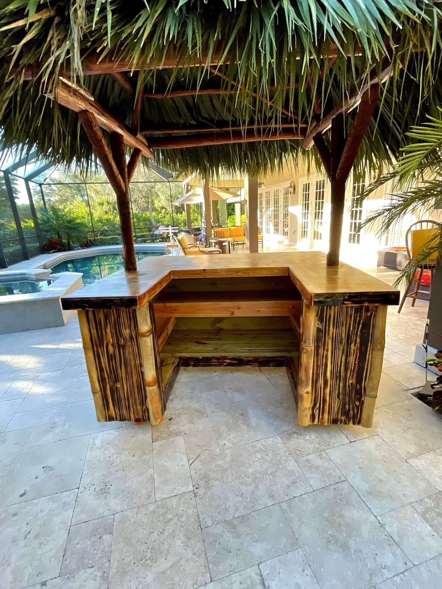 Tiki bar next to a pool