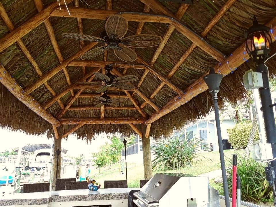 Tiki on dock with built-in fans